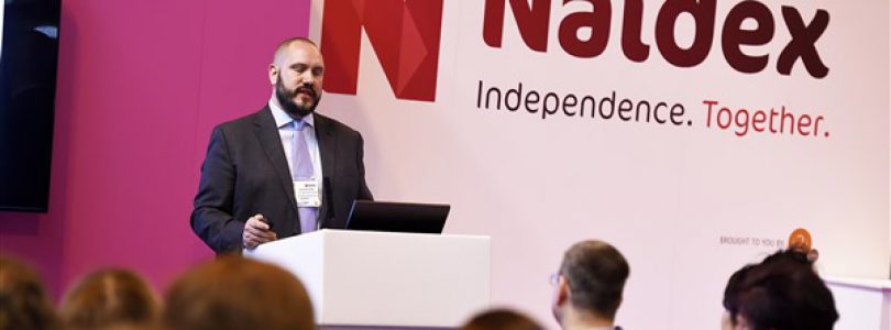 Naidex logo and speaker