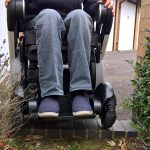 TGA Whill goes over a step